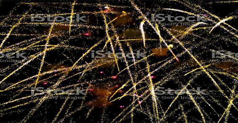 A close up of fireworks in the night sky