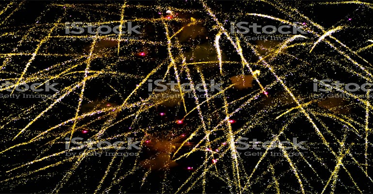 A close up of fireworks in the night sky